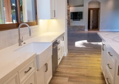 Custom flooring and kitchen countertops in modern home remodel